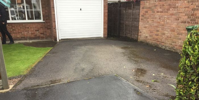 Before image of a driveway in Huddersfield