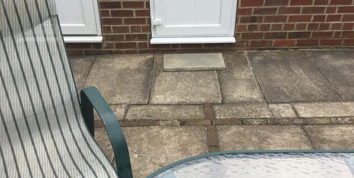 Before image of flagstones and step